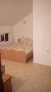 Postel nebo postele na pokoji v ubytování Apartmani Alex Beach