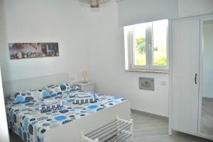 Ένα ή περισσότερα κρεβάτια σε δωμάτιο στο Venti d'aMare