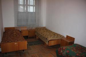 Ένα ή περισσότερα κρεβάτια σε δωμάτιο στο Firuza Hostel