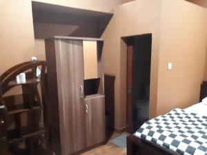 Postel nebo postele na pokoji v ubytování Indy House