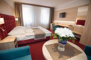 Postel nebo postele na pokoji v ubytování Hotel Texicana