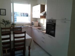 Kuchnia lub aneks kuchenny w obiekcie Apartment ML