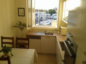 Kuchyňa alebo kuchynka v ubytovaní Apartment ML