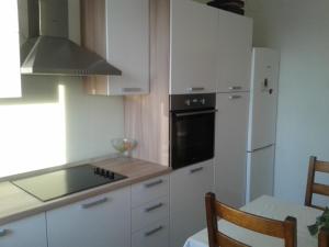 Kuchyňa alebo kuchynka v ubytovaní Apartment ML