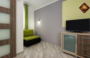 TV a/nebo společenská místnost v ubytování Apart-club Zora
