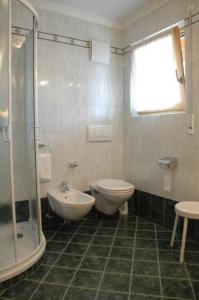 Koupelna v ubytování Hotel Falzares