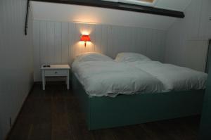 Postel nebo postele na pokoji v ubytování Hoeve Schoonzicht