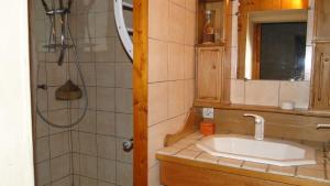 a bathroom with a sink and a shower at Gite Seguret in Gresse-en-Vercors