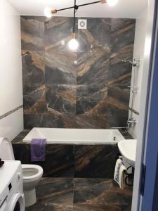 Ένα μπάνιο στο Apartament Birutes 22