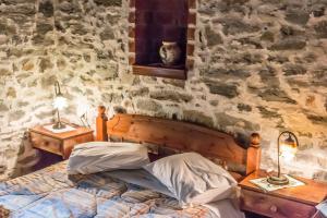 Posteľ alebo postele v izbe v ubytovaní Archontiko Montana