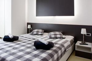 Postel nebo postele na pokoji v ubytování Apartments Petra