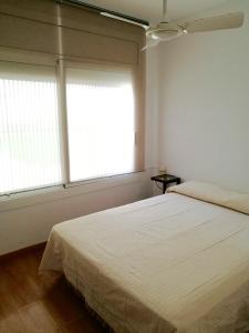 A bed or beds in a room at Casa Lorca Még 12 kép