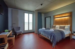 Postel nebo postele na pokoji v ubytování Hotel Rossi