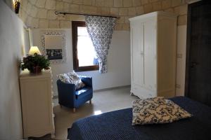 Letto o letti in una camera di Trullo delle Querce Suite Private Pool