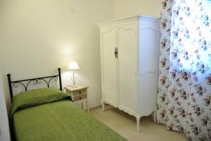 Letto o letti in una camera di Trullo delle Querce Suite Private Pool