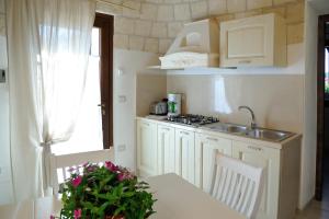 Cucina o angolo cottura di Trullo delle Querce Suite Private Pool