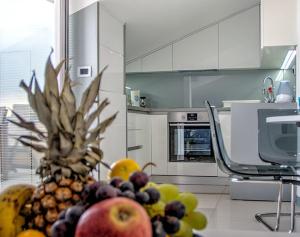 Kuchyň nebo kuchyňský kout v ubytování Apartments Petra