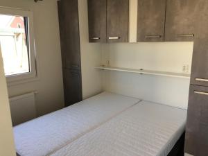 Ένα ή περισσότερα κρεβάτια σε δωμάτιο στο Beachhouses Texel