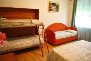 Postel nebo postele na pokoji v ubytování Villa Chiara