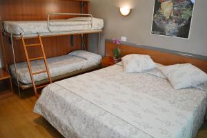Postel nebo postele na pokoji v ubytování Villa Chiara
