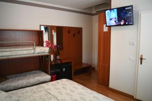 Postel nebo postele na pokoji v ubytování Villa Chiara