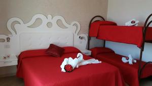 A bed or beds in a room at Tesori del Salento