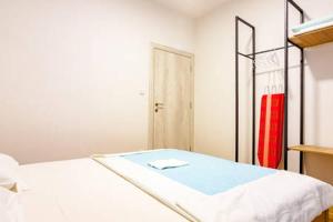 Postel nebo postele na pokoji v ubytování VilaA21