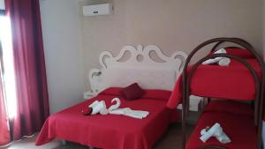 A bed or beds in a room at Tesori del Salento