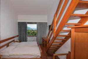 Postel nebo postele na pokoji v ubytování Hotel Campagna