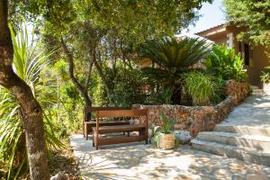 Vonkajšia záhrada v ubytovaní Relax tiny villas 40 meters of the beach