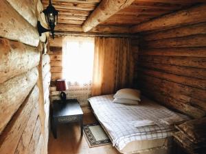 Postel nebo postele na pokoji v ubytování Guest House Viesu Māja Klētnieki