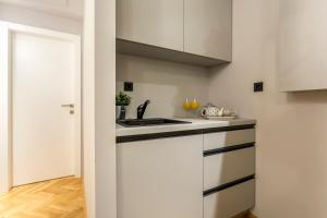 Kuchyň nebo kuchyňský kout v ubytování Central Rooms Split