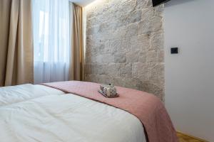 Postel nebo postele na pokoji v ubytování Central Rooms Split