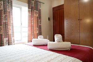 Postel nebo postele na pokoji v ubytování Hostal Victoria