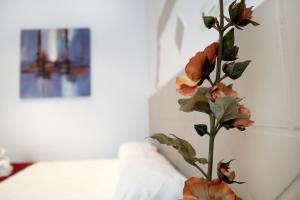 Postel nebo postele na pokoji v ubytování Hostal Victoria