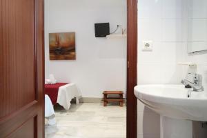 Koupelna v ubytování Hostal Victoria