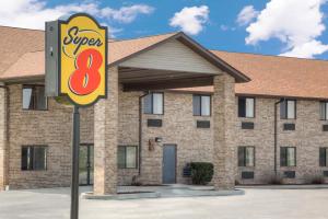 a super sign in front of a building at Super 8 by Wyndham Gas City Marion Area in Gas City