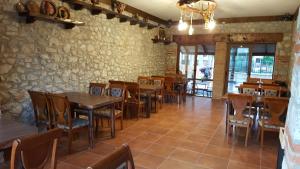 En restaurant eller et andet spisested på Hotel Bujtina Ollga
