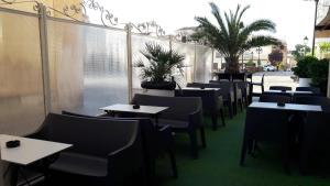 Reštaurácia alebo iné gastronomické zariadenie v ubytovaní Hotel Juan Carlos I