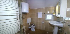 Koupelna v ubytování Apartments Villa Kukoljac