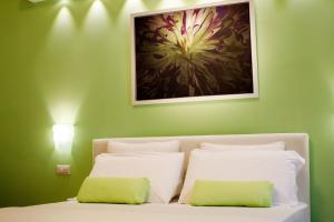 A bed or beds in a room at Il Nido del Gabbiano