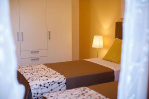 A bed or beds in a room at Il Nido del Gabbiano