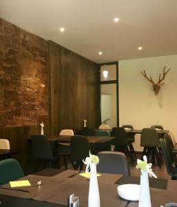Restoranas ar kita vieta pavalgyti apgyvendinimo įstaigoje Marmotta Alpin hotel