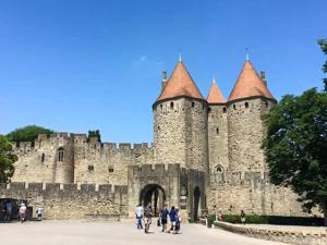 a castle with people standing in front of it at Nina in Carcassonne