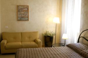 Postel nebo postele na pokoji v ubytování B&B Dolce Casa