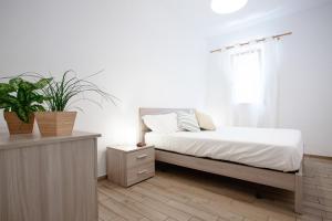 Posteľ alebo postele v izbe v ubytovaní 6Venti close to the beach of Marina di Modica,5 minutes walking distance about
