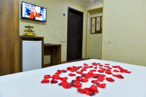 Postel nebo postele na pokoji v ubytování Hotel Lion