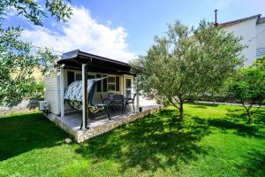 Vonkajšia záhrada v ubytovaní Apartments Coronata
