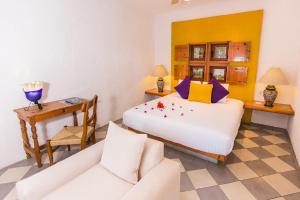 Postel nebo postele na pokoji v ubytování Casa Natalia Boutique Hotel Adults Only