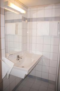 Koupelna v ubytování Midtnes Hotel